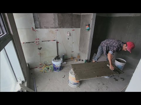 quá trình thợ bên tuấn thi công ốp gạch cải tạo căn hộ cao cấp gạch 120×60