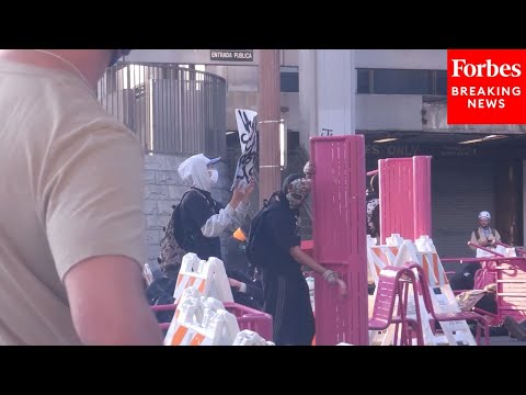Police And Protesters Face Off During Protests Near City Hall In Los Angeles, California
