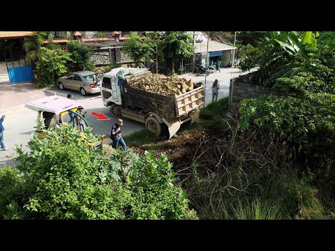 Amazing Start New Landfill Use Dump Truck Unload Stone with Skill D20P Dozer Pushing into Flood Area