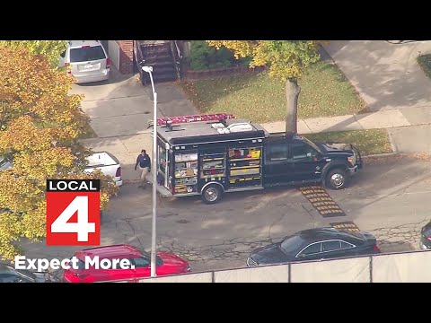 Aerials: FBI raids Dearborn homes -- part 2