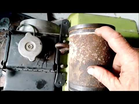 ZUBR walk-behind tractor replacing the motor sleeve