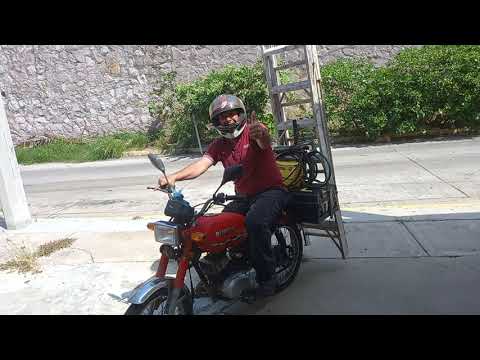 Mexican Motos...Suzuki AX 100...loaded for work