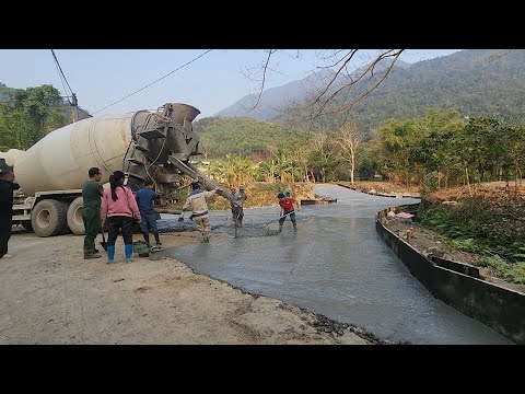 Time-lapse video of the process of building a road across the stream