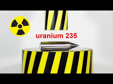 HYDRAULIC PRESS AGAINST URANIUM PROJECTILE