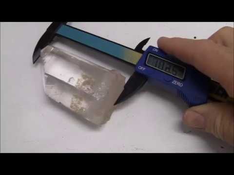 Gemstone faceting: cutting  a huge quartz stone (portuguese cut)