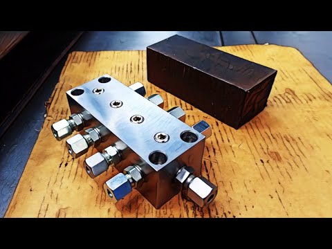 Construccion de un distribuidor de engrase...Construction of a grease distributor