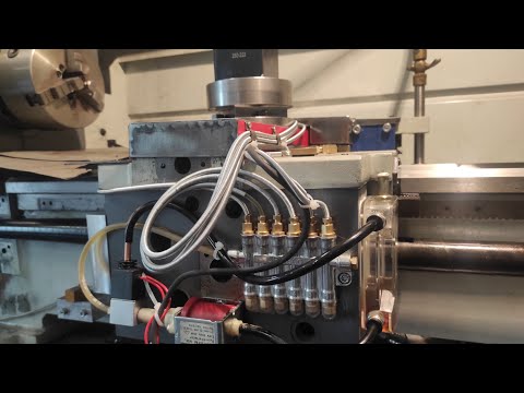 Lathe Guideway Lubrication System. Ball Screw Protection