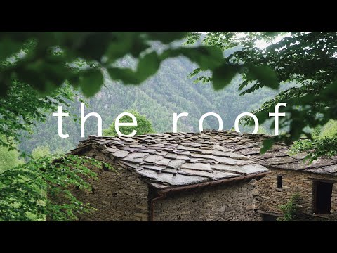 Complete Renovation of a Traditional Stone Roof in the Italian Alps