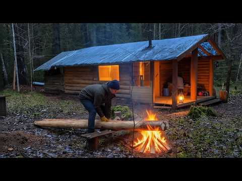 We built a cabin in the wild forest and are now building a summer kitchen.