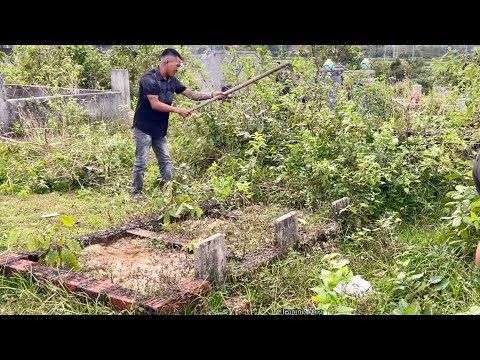 Clearing the grass and trees that had hidden the resting space of the graves