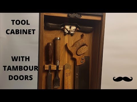 Tool cabinet with sliding tambour doors