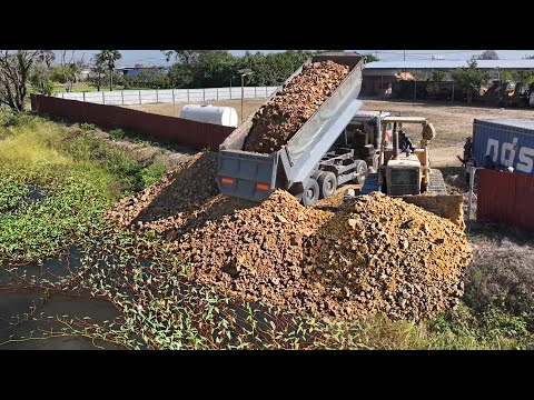Amazing Operator Skill D53A Bulldozer & 25 5 TON Dump Trucks Fill Rock Soil into Water