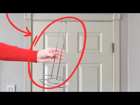 Stick a paper towel holder on your door (BRILLIANT!)
