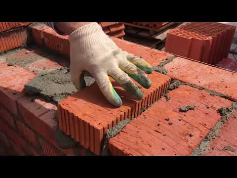 Черновая кладка стен дома Каменщик