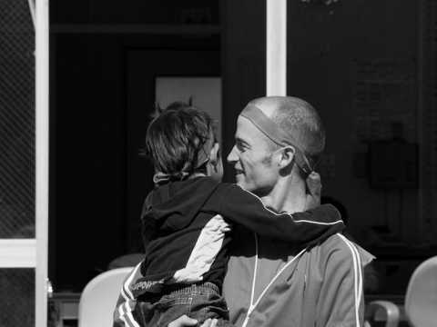 Why does Japan still use orphanage-style care rather than foster care and adoption?