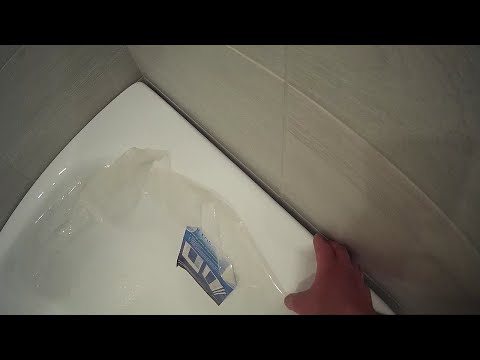 How to close a large gap between the bathtub and the tiles