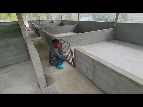 Time-lapse video of welding iron doors and installing automatic pig feeders