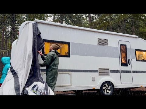 CAMPING IN HEAVY RAIN IN A CARAVAN AND INFLATABLE TENT WITH A STOVE
