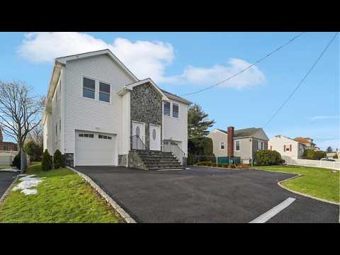 INSIDE a Brand-New Two-Family with 6,200 SF & Dual Garages | SERHANT. Tour