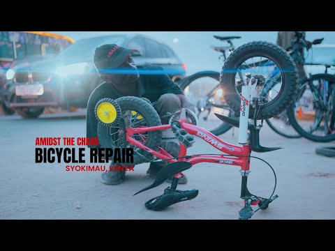 Amidst the Chaos: Bicycle Repair During Rush Hour in Syokimau, Kenya