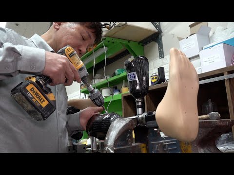 Process of Making Artificial Carbon Leg For Human. Prosthetic Leg Technician in Korea.