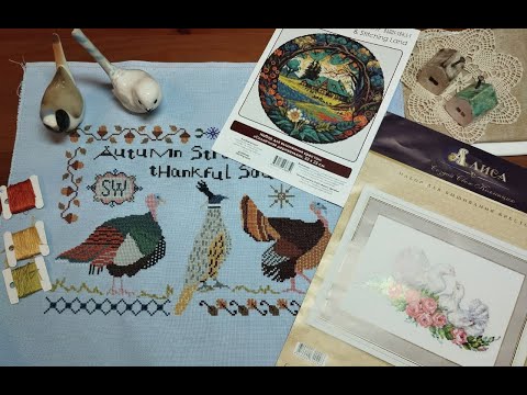 Показываю законченную вышивку и распаковываю два новых набора