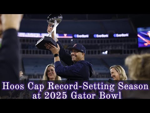 Virginia head football coach Tony Elliott lifted another prize in triumph late Saturday night