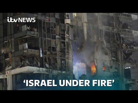 'All of Israel is under fire': Blasts and smoke as Iran launches hundreds of missiles | ITV NEWS