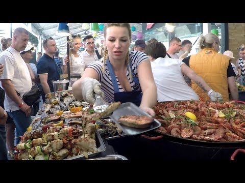 Huge Pans Cooking Huge Doses of Fish.  Kiev Street Food, Ukraine