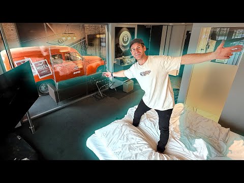 YOU CAN LITERALLY PARK A CAR IN THIS UNIQUE HOTEL ROOM! - V8 HOTEL