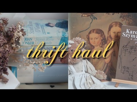 a recent thrift haul, including books and clothes