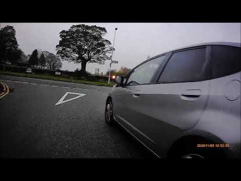 Cyclist overtaken and left hook by terrible driver YH60 FJA