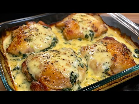 Baked chicken thighs in a creamy spinach sauce - a flavor you can't tear yourself away from!