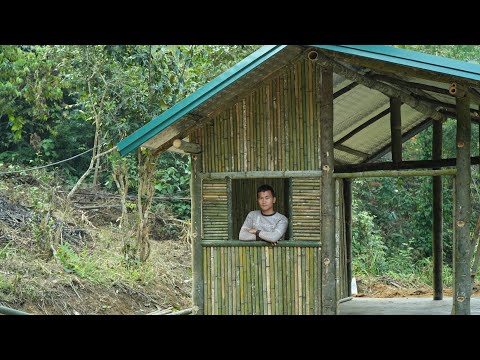 Mr. Thang's handcrafted bamboo wall is a unique and eye-catching creation.