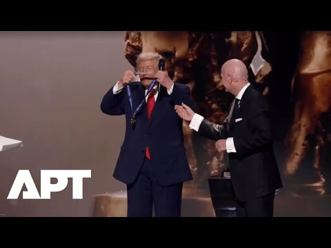 Trump Awarded FIFA’s First-Ever Peace Prize at World Cup Draw Ceremony, Wears it Himself | APT