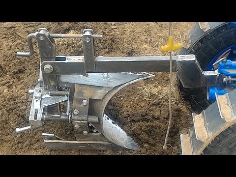 Оригинальный оборотный плуг.