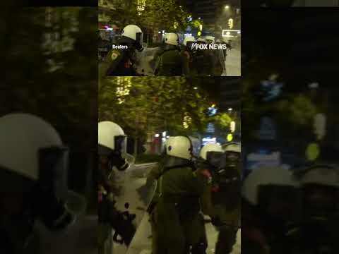WATCH: Riot police strike protesters with BATONS in Greece #shorts #worldnews #police #viral #fox