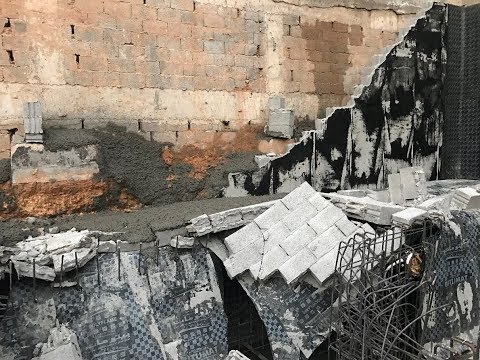 حتى لا يسقط جدار حماية عازل الخزان الارضي او القبو تدعيم الجدار البلوك بالصب خلفه وتدعيمه من الامام