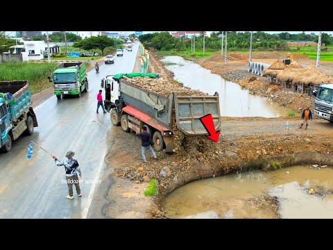 Amazing!! Heavy dump truck 25Ton unloading Stone landfilling repair Road and new Bulldozer pushing.