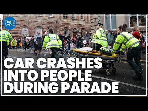 Car runs into crowd at Liverpool FC victory parade