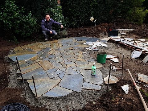 Natursteinplatten verlegen