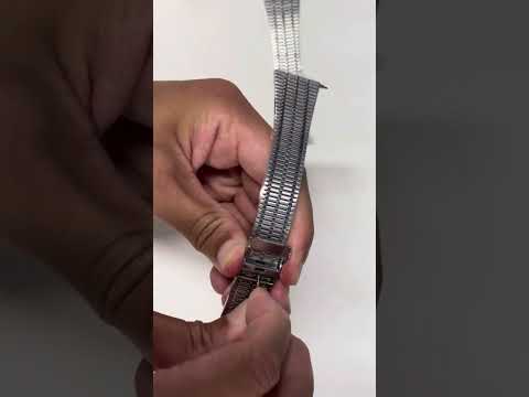 Adjusting the micro adjustable clasp on a watch strap