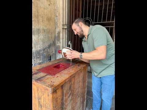 Hand Dipping Wax Top on Custom Bottle of Maestro Dobel Tequila at La Rojeña Distillery