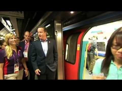 Prime Minister David Cameron rides London Underground to Olympic Park