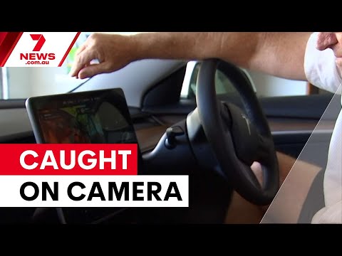 Tesla's cameras catch woman keying car | 7NEWS