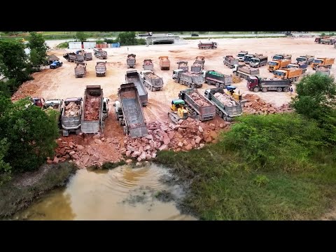 Smooth Operation of Heavy Equipment Fast Process Use Huge Mountain Stones For Landfilling