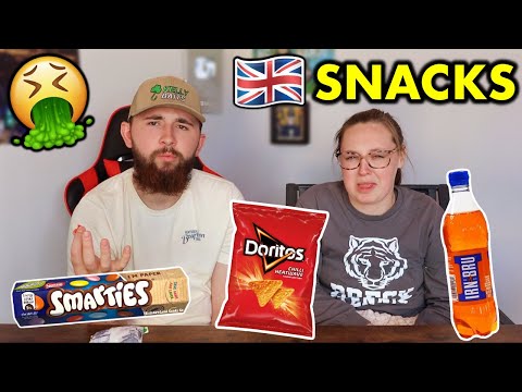 Americans Try BRITISH Snacks For The FIRST TIME! *SHOCKING*
