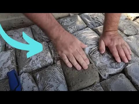 The brilliant reason he lays Ziploc bags of cement in his backyard