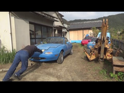 WB04 予備のアームを藪から引き出します　Pull out the spare arm from the bushes