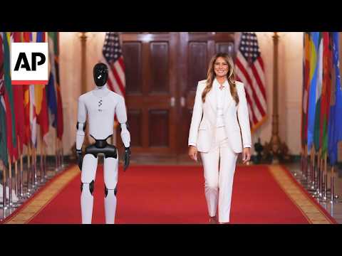 Melania Trump shares the spotlight with a robot at an education and tech event